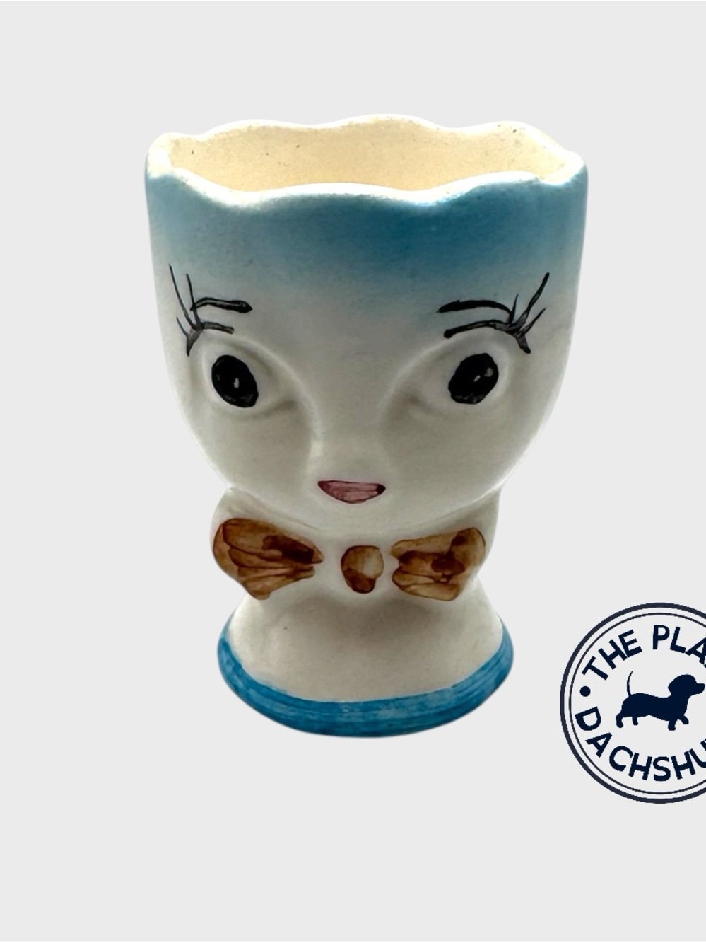 Vintage Ceramic Face Egg Cup  with Blue Trim